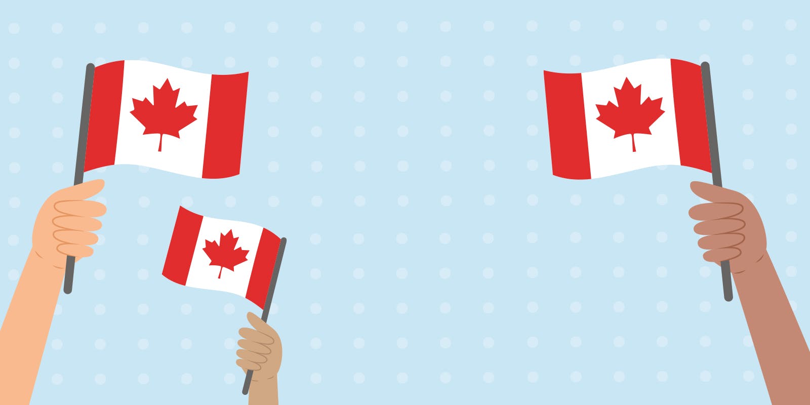 Hands holding Canadian flags